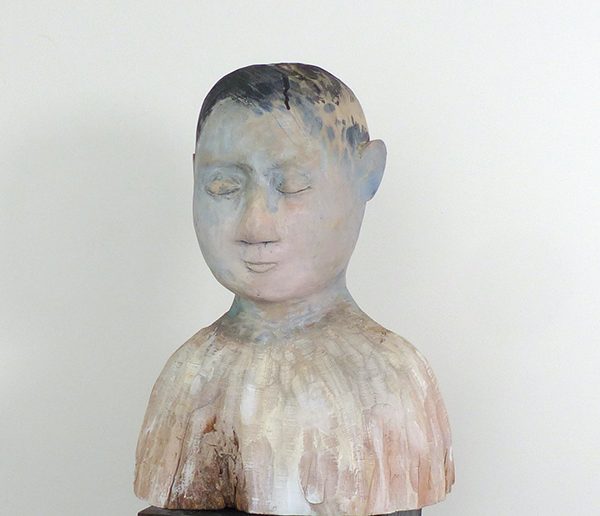 Boy, Carlos Zapata 2020. Polychrome wood, 45 cm high.