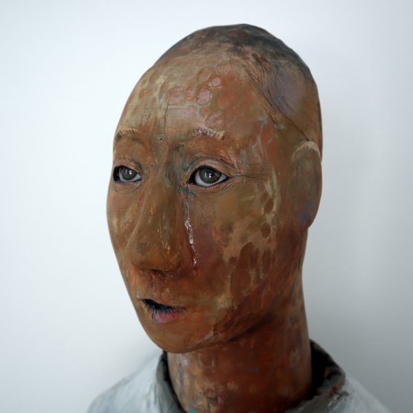 Trail of Tears, Carlos Zapata 2021. Polychrome carved wood and glass eyes, 90 H x 40 W x 42 D cm.